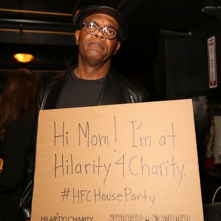 Samuel L. Jackson holding a board